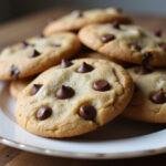 Deliciously baked banana chocolate cookies with butterscotch and chocolate chips, beautifully presented on a plate.