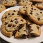 Delicious traditional chocolate chip cookies ready to enjoy, perfecting classic recipes by Betty Crocker and Joanna Gaines.
