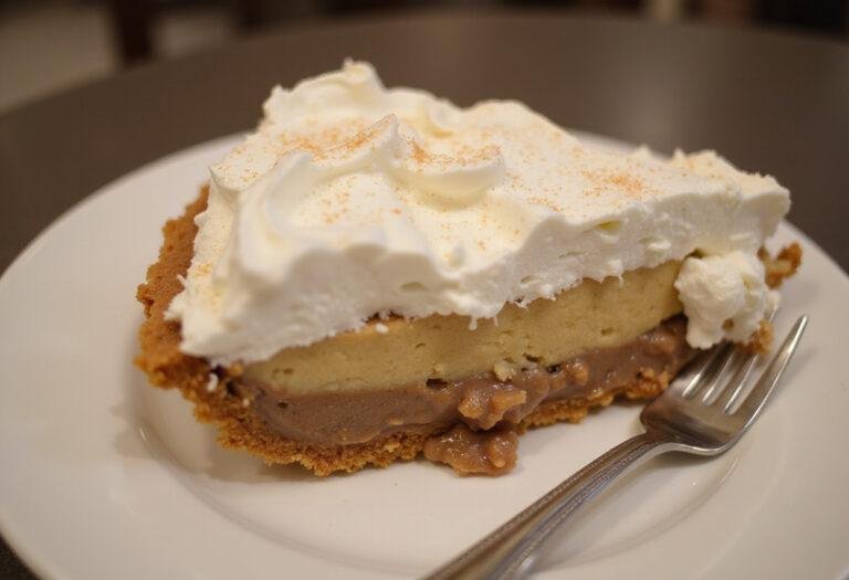Served slice of Whipped Root Beer Cream Pie decorated with sparkling sugar, perfect for dessert.