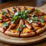 Delicious BBQ chicken pizza, inspired by California Pizza Kitchen and Domino's, ready to be served, showcasing melted cheese and flavorful toppings.