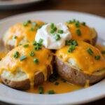 Delicious air fryer twice baked potatoes served on a plate, showcasing the final result of this easy air fryer recipe.