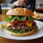 Delicious ground beef nutrition burger served with fries, showcasing a tasty meal presentation.