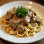 Final presentation of hamburger helper beef stroganoff, highlighting the creamy and savory blend of flavors in this comforting meal.