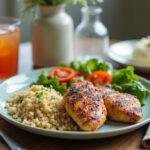 Final presentation of high protein fast food meal, showcasing an appetizing plate of grilled chicken, quinoa, and vegetables for a healthy dining experience.
