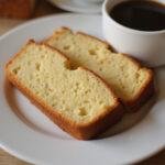 Deliciously sliced pound cake using cake mix displayed on a plate, ideal for serving at gatherings or enjoying with coffee.
