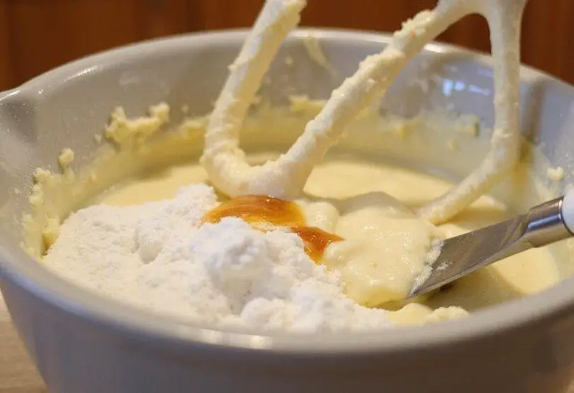 Ravenclaw recipes featuring cream cheese mixing with sugar and vanilla for Butterbeer Cheesecake.