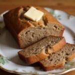 Sliced classic banana bread served on a plate, illustrating the delightful outcome of 4 ingredient banana bread recipes.