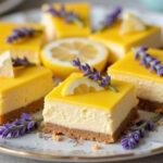 Deliciously presented Golden Hufflepuff Lemon Lavender Cheesecake Bars with Shortbread Crust, showcasing vibrant flavors and perfect texture.