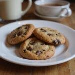 Delicious paleo chocolate chip cookies arranged on a plate, perfect for a healthy snack or dessert.