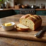 Final presentation of Rustic Irish Soda Bread on a rustic cutting board with butter, capturing the essence of homemade baking.