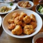 Stunning display of air fryer roasted cauliflower on a dining table, perfect for showcasing your healthy culinary skills.