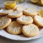 Delicious vegan lemon sugar cookies, a perfect eggless treat to enjoy, beautifully presented on a plate.
