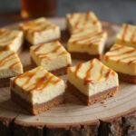 Final display of Enchanted Hufflepuff Butterbeer Cheesecake Bars with toffee infusion, highlighting the delicious layers and presentation.