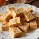 Delicious Harry Potter Butterbeer Fudge served on a plate, styled with butterscotch sauce, perfect for fans of the magical world.