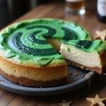 The finished Ravenclaw Starry Night Butterbeer Cheesecake with Green Swirl showcases an enchanting dessert perfect for any occasion.