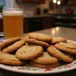 Finished Weasley's Wizard Wheezes U-No-Poo Butterbeer Cookies served on a platter with Butterbeer, perfect for a Harry Potter-themed dessert table.