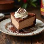 Delicious slice of Harry Potter Double Chocolate Butterbeer Cheesecake ready to serve, a magical dessert for fans.