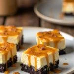 The finished Enchanted Hufflepuff Butterbeer Cheesecake Bars with Toffee Infusion and Oreo Crust displayed on a rustic wooden table, highlighting the delicious layers and toppings of this magical dessert.